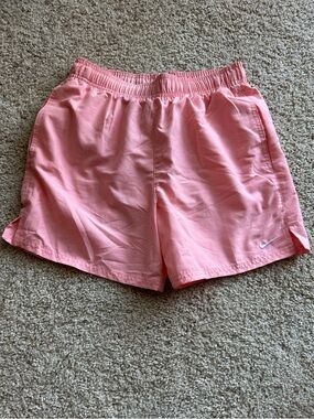 Nike men’s Coral Pink swim Shorts